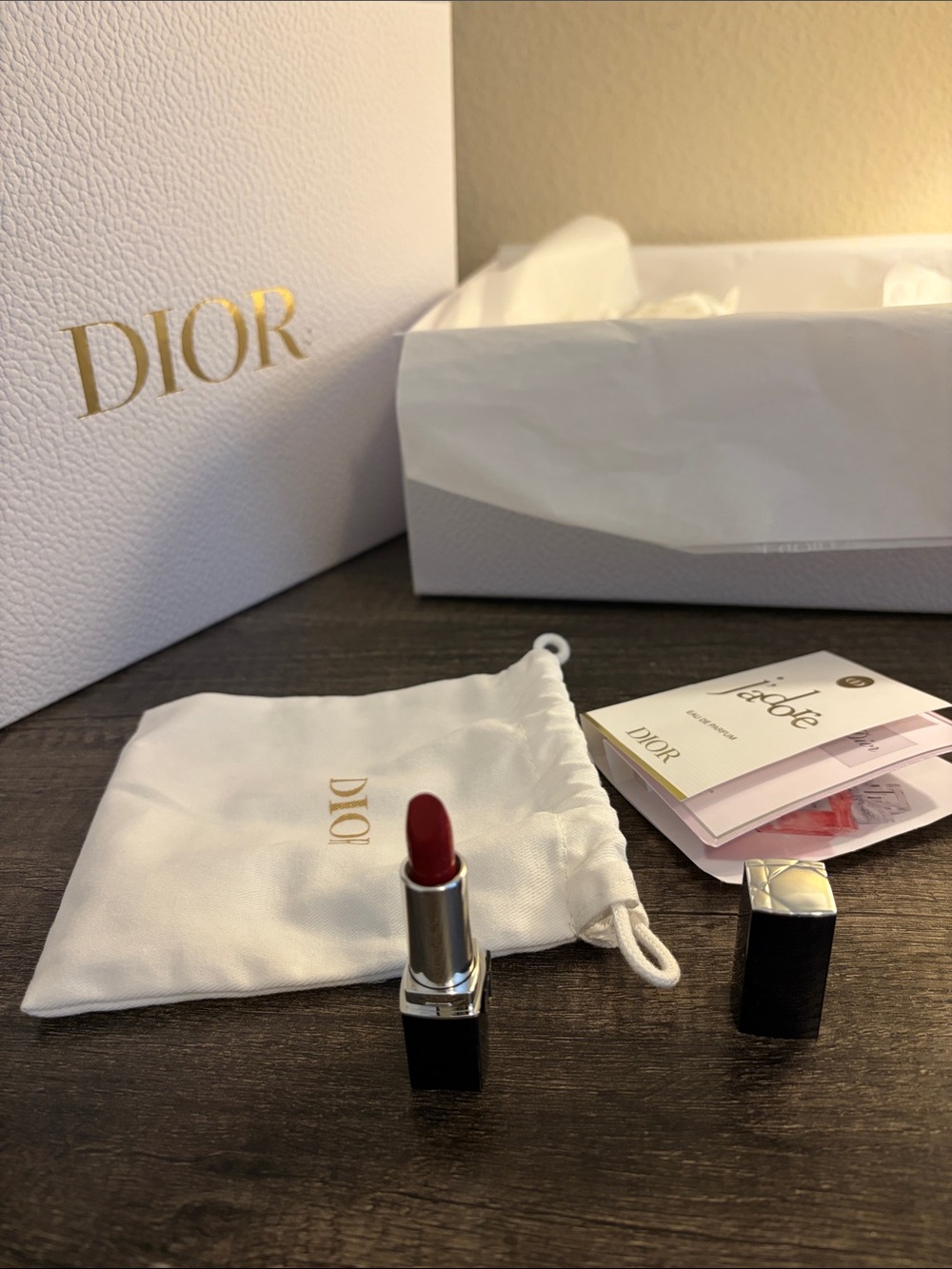 Dior Red Lipstick with Black Silvertone Case includes bag and box